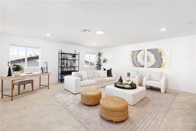 living room with light colored carpet