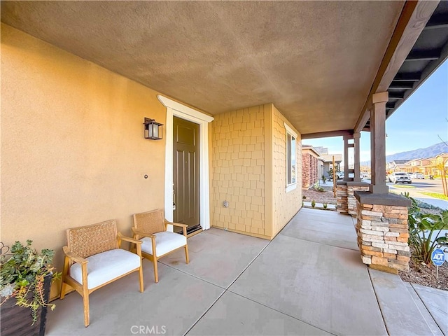 view of patio featuring a mountain view