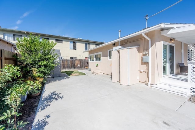 rear view of property featuring a patio