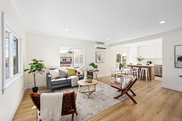 living room featuring a wall mounted air conditioner, crown molding, and light wood-type flooring