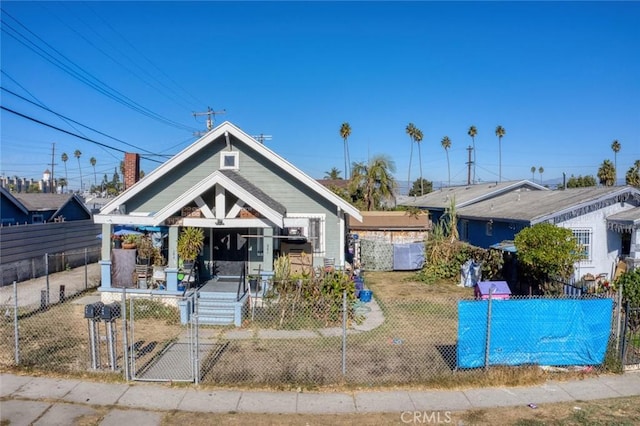 bungalow-style house featuring covered porch