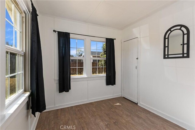 spare room featuring hardwood / wood-style flooring