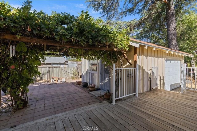 deck featuring a garage