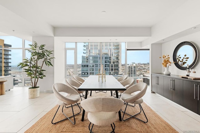 tiled dining space with expansive windows