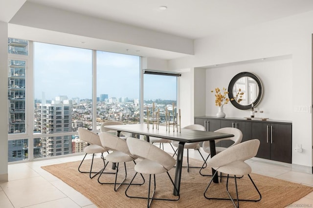 tiled dining area with expansive windows