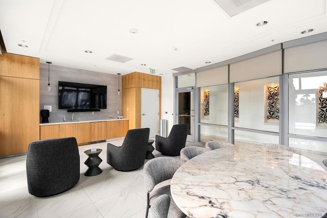 dining space featuring sink