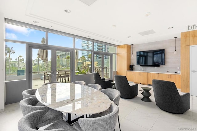 dining space featuring french doors