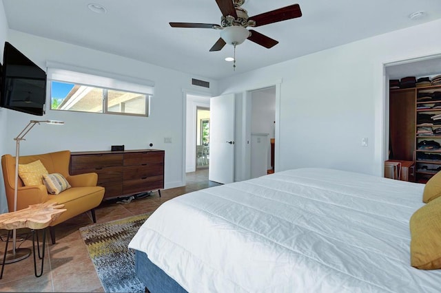 bedroom featuring ceiling fan and tile patterned floors