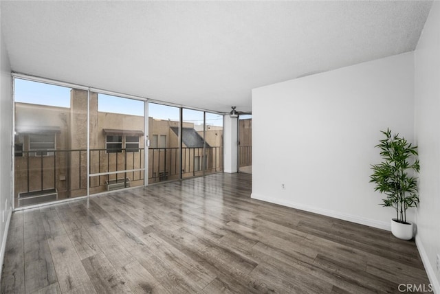 empty room featuring wood-type flooring