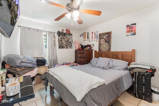 bedroom with light tile patterned flooring and ceiling fan