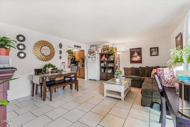 living room with light tile patterned flooring