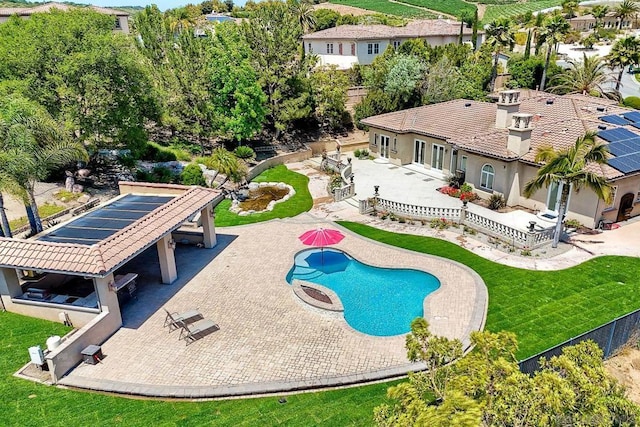 view of pool featuring a patio