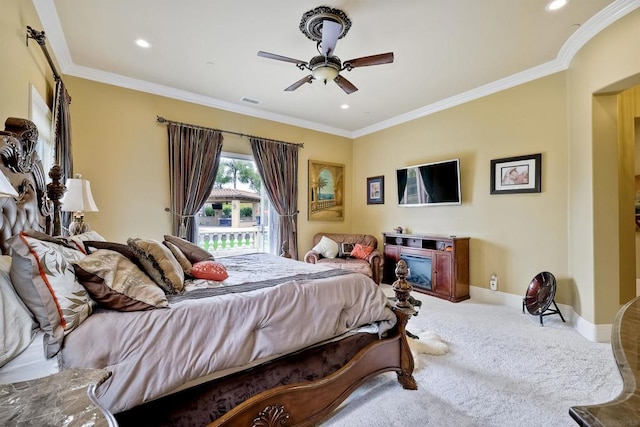 bedroom with ceiling fan, ornamental molding, and carpet flooring