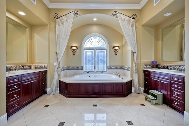 bathroom featuring a bath, tile patterned flooring, crown molding, and vanity