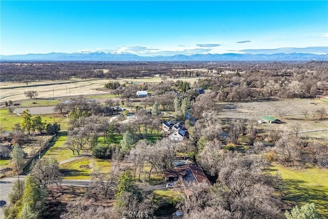 aerial view featuring a rural view and a mountain view