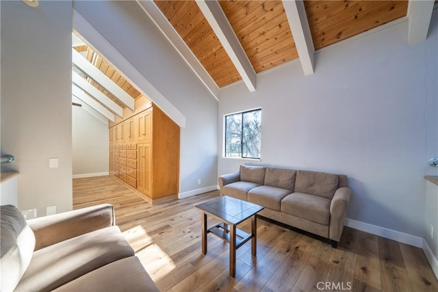 living room with light hardwood / wood-style floors, wooden ceiling, high vaulted ceiling, and beam ceiling