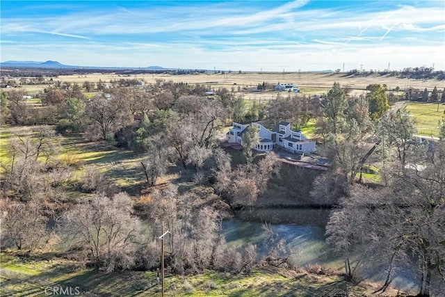 drone / aerial view with a rural view and a mountain view