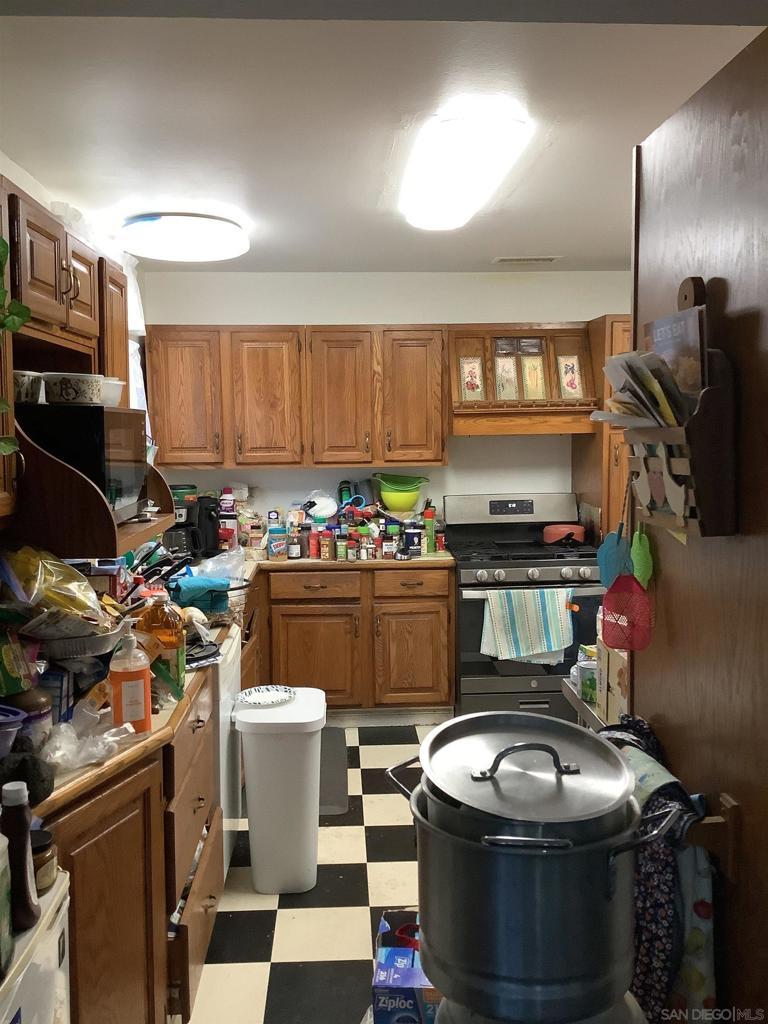 kitchen with stainless steel range with gas cooktop