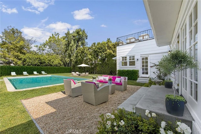 view of swimming pool featuring an outdoor hangout area and a patio area