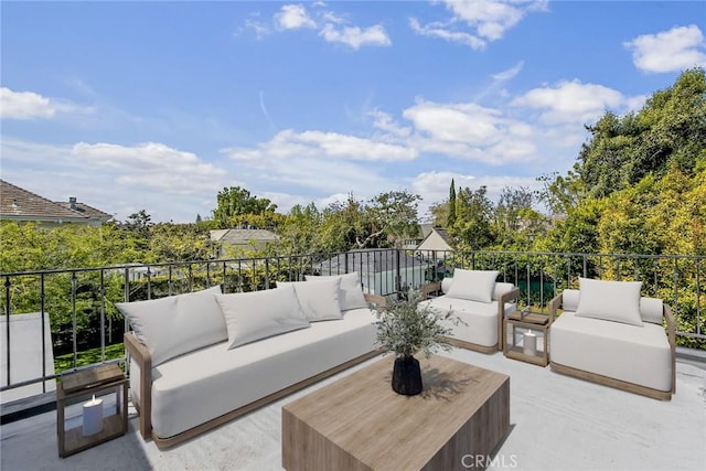 view of patio / terrace featuring a balcony and outdoor lounge area