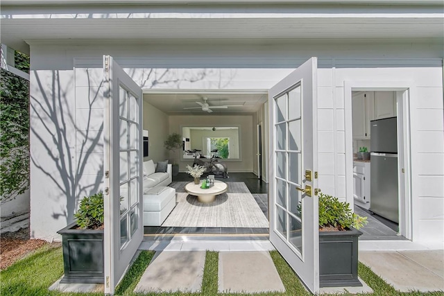 exterior space featuring ceiling fan and french doors