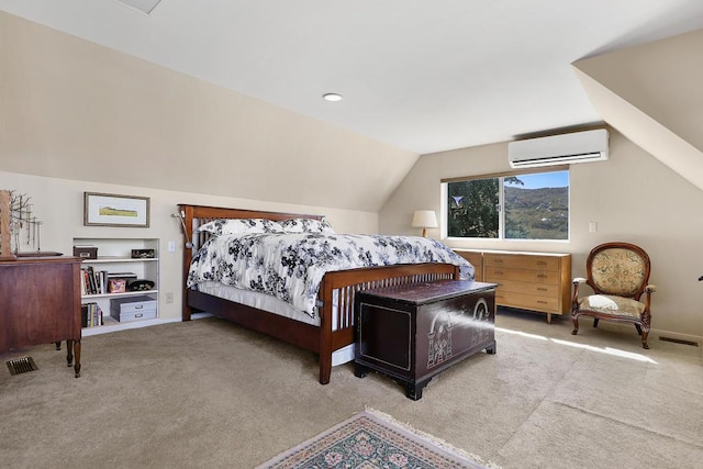 bedroom with lofted ceiling, a wall mounted air conditioner, and carpet floors