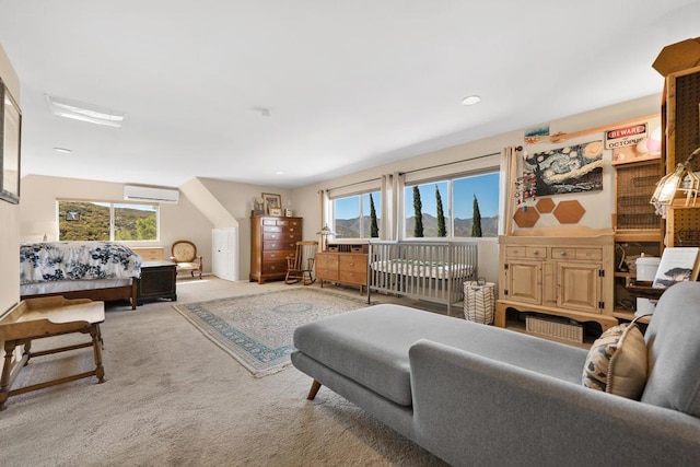 bedroom featuring light carpet and an AC wall unit