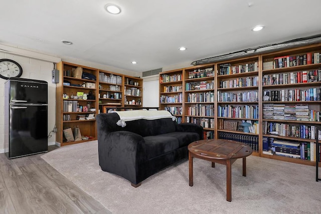 living area featuring light hardwood / wood-style flooring