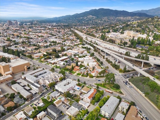 drone / aerial view featuring a mountain view