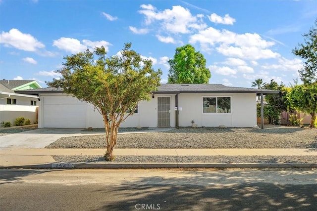 single story home featuring a garage