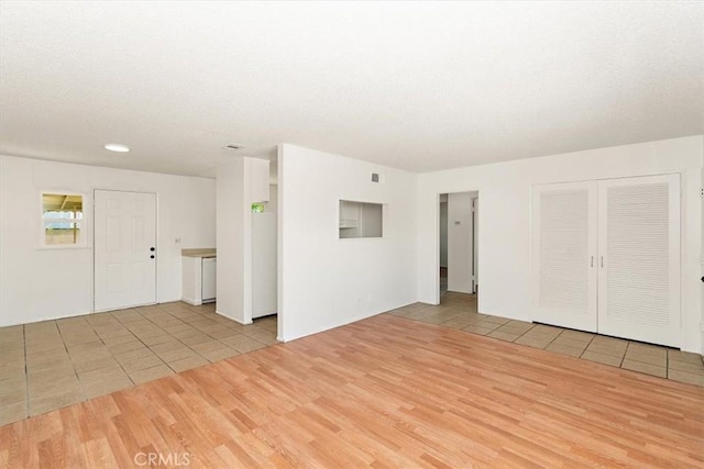 interior space featuring light tile patterned floors