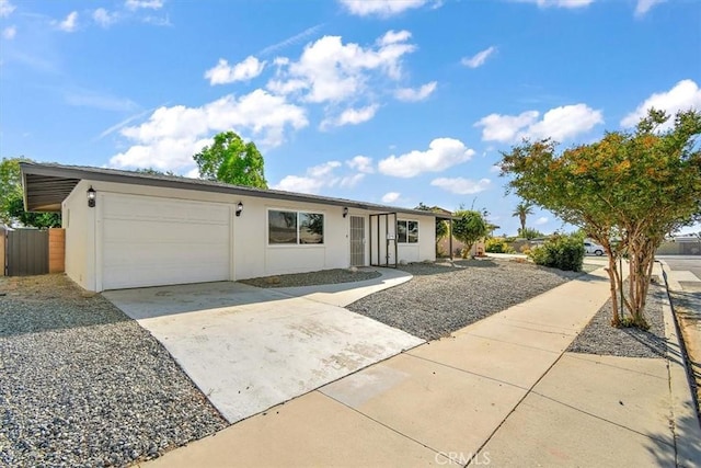 ranch-style home with a garage