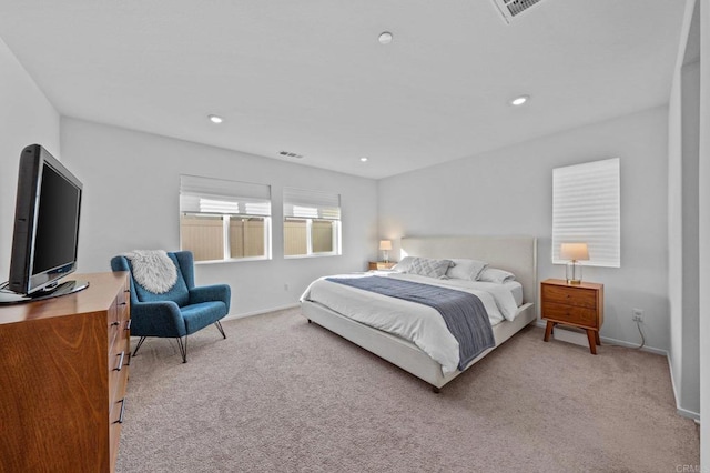 bedroom with light colored carpet