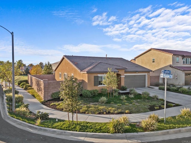 view of front of home with a garage