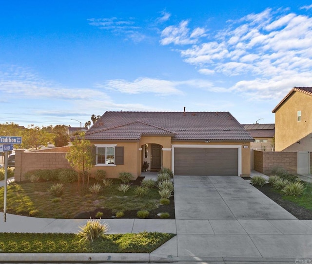 view of front of property featuring a garage