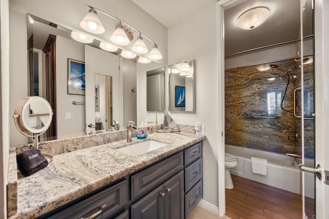 full bathroom featuring toilet, shower / bath combination, and vanity