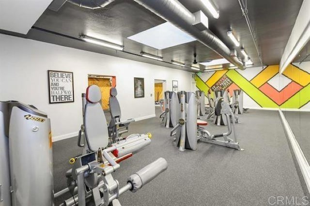 gym with ceiling fan