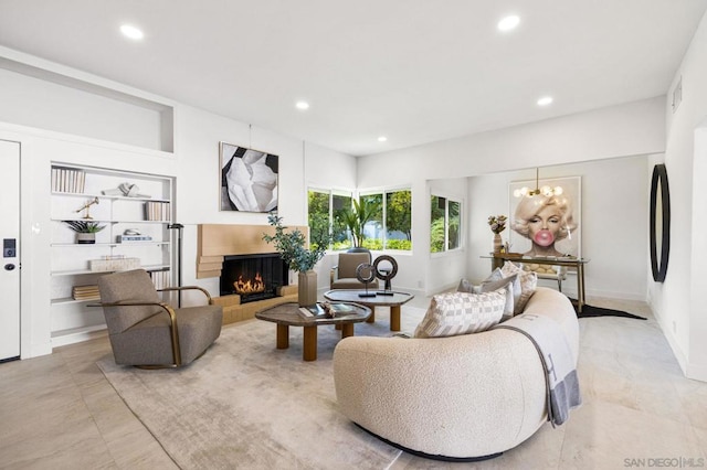 living room featuring an inviting chandelier