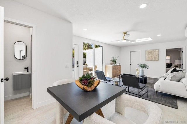 living room featuring ceiling fan