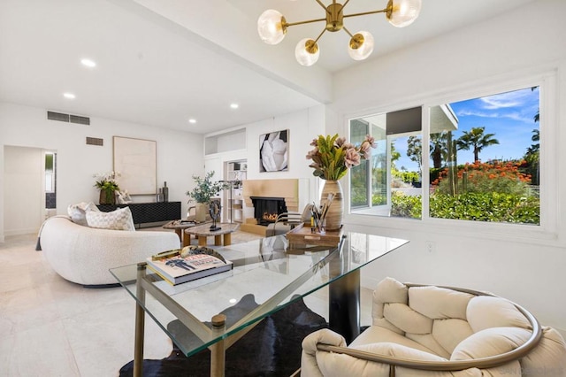 dining space with an inviting chandelier