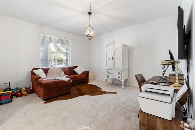 office featuring a notable chandelier and carpet flooring