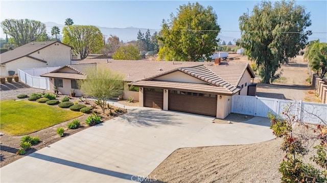 ranch-style home with a garage