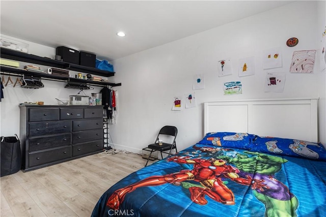 bedroom featuring light hardwood / wood-style flooring