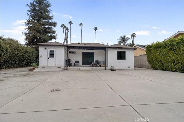 rear view of house with a patio area