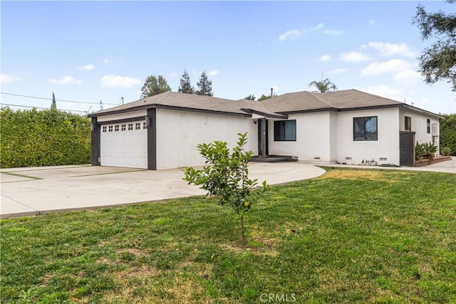 single story home with a front lawn and a garage