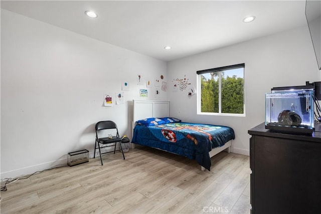 bedroom featuring light hardwood / wood-style flooring