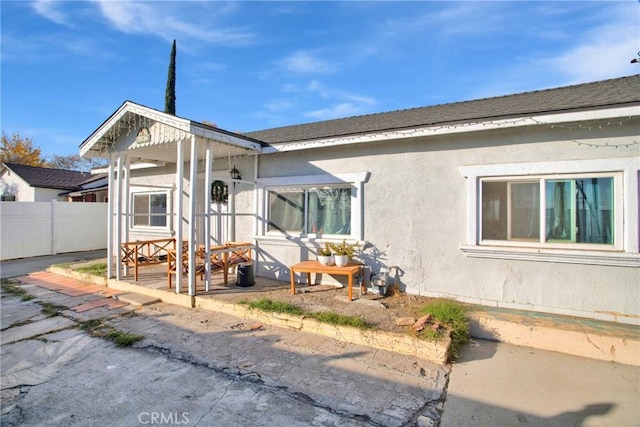 view of front of home featuring a patio