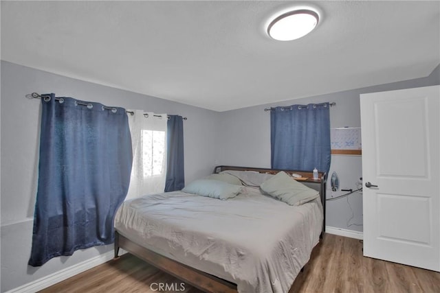 bedroom featuring hardwood / wood-style floors