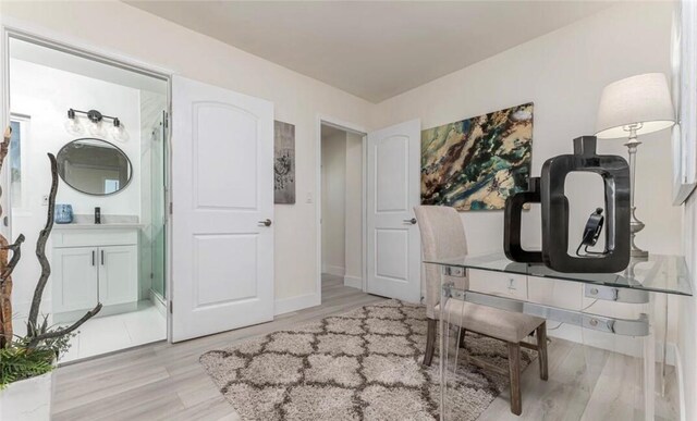 home office featuring light wood-type flooring