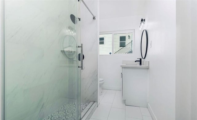 bathroom with a marble finish shower, baseboards, toilet, tile patterned floors, and vanity